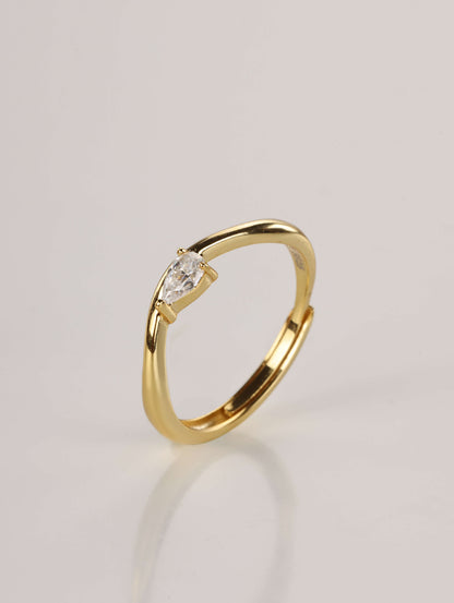 The Curved Pear Solitaire: 0.5ct Moissanite Ring