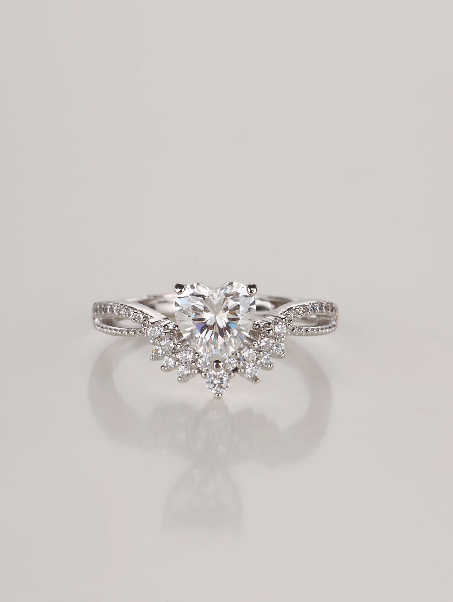 1ct heart shaped moissanite ring with side stones on 925 sterling silver band