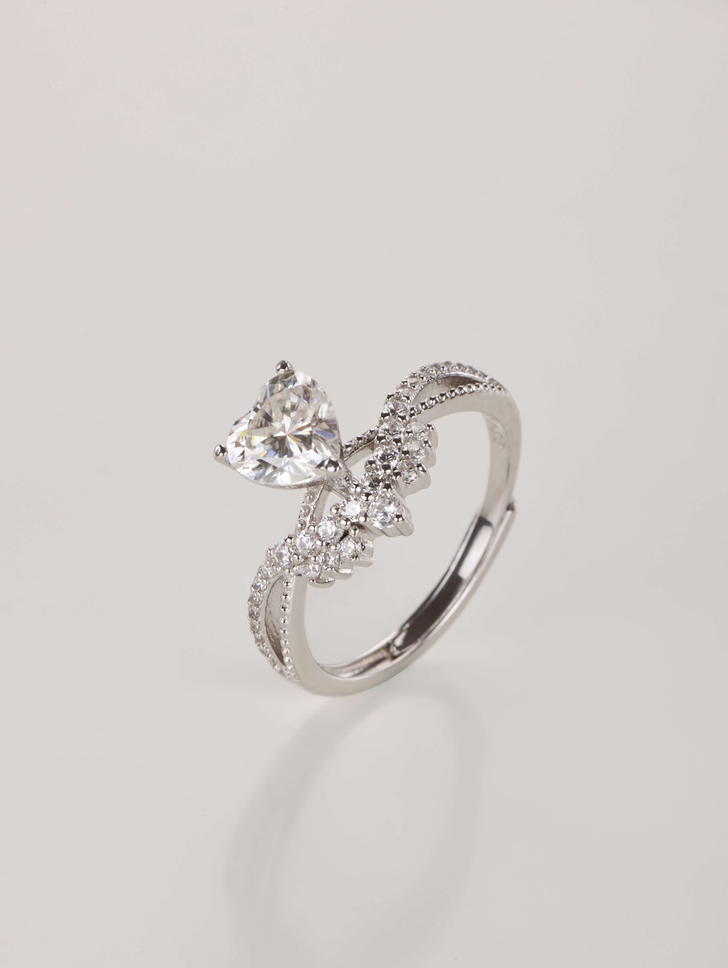 Sparkling 1 carat heart cut moissanite diamond alternative ring catching the light