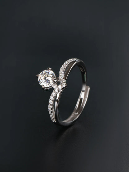 V-shaped sterling silver crown ring with 0.5ct round brilliant moissanite center stone chevron band