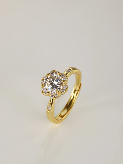 A close-up of a hand wearing the 1ct flower design moissanite ring, demonstrating the sparkling halo effect and everyday elegance in natural lighting.