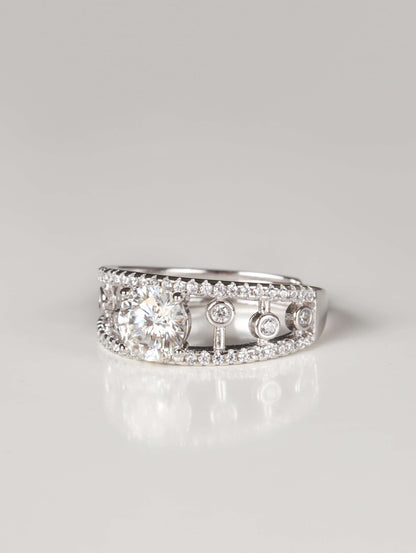 Hidden adjustable open band back detail on a vintage art deco style filigree silver ring