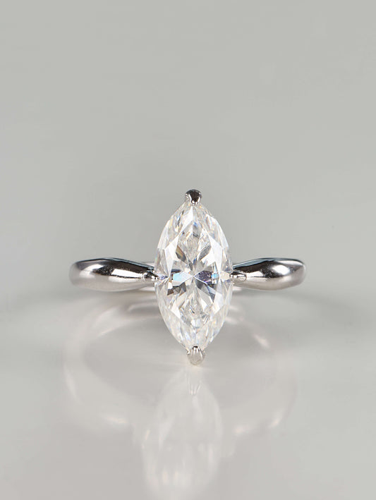Close-up macro shot of the 925 sterling silver stacking ring set, showing the structural layering and brilliant fire of the marquise and accent moissanite stones.
