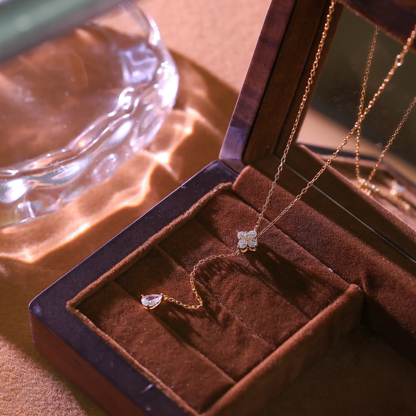 14K gold plated sterling silver Y-necklace with flower crystal connector and drop chain.