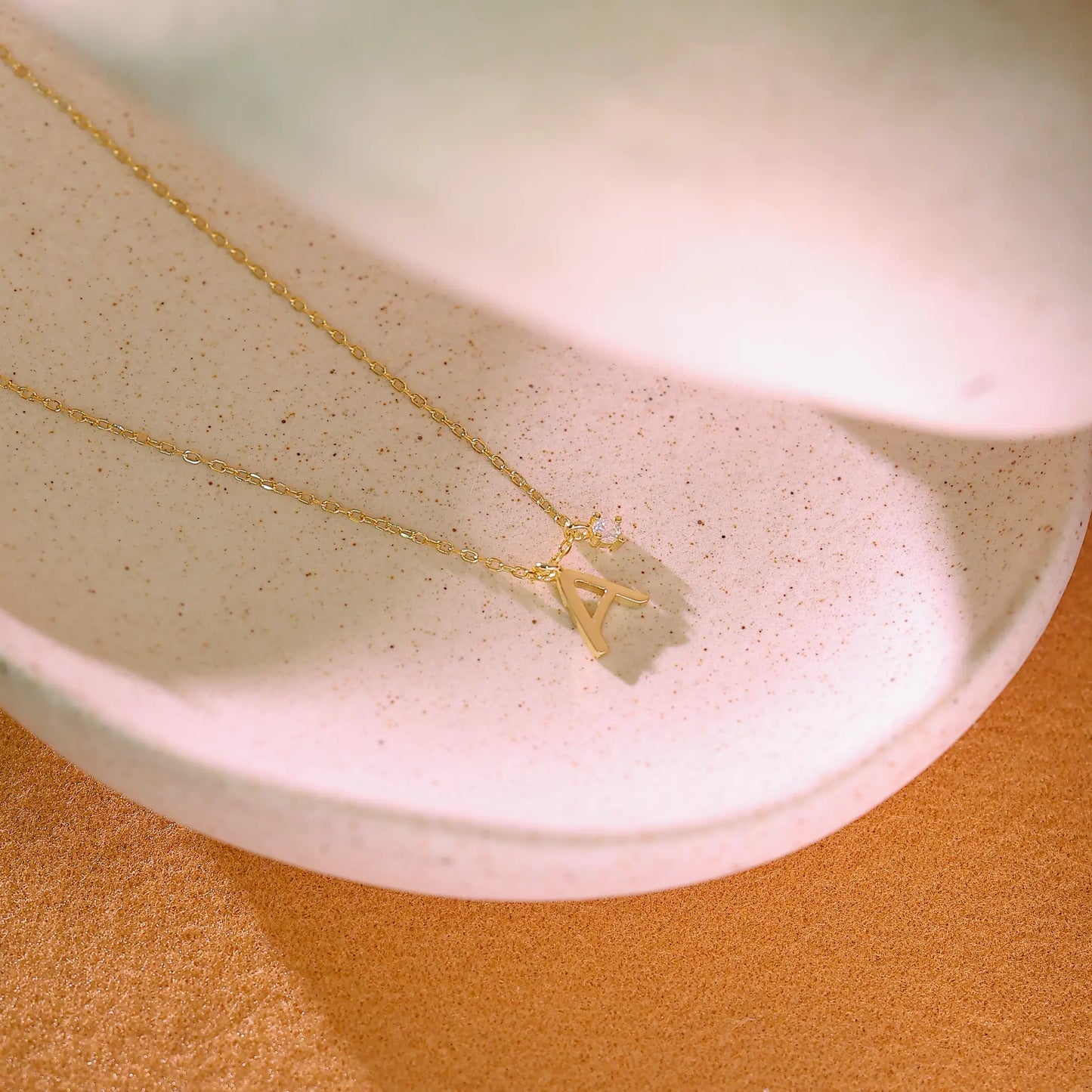 Adjustable gold chain necklace with durable lobster clasp. Perfect length for layering with other gold chains