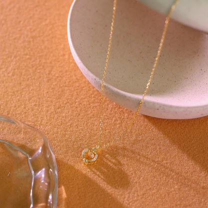 Delicate gold cable chain showing the fine links and light-catching finish.