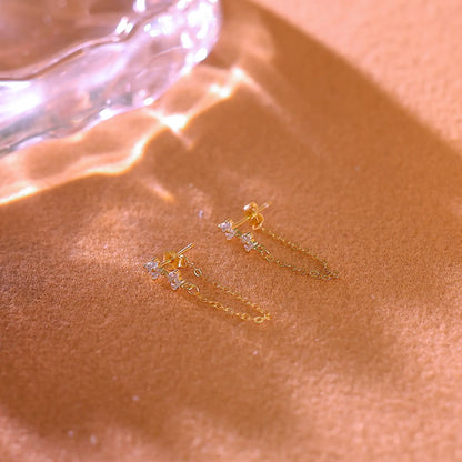 Macro shot of the cubic zirconia flower cluster setting on the earring post.