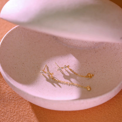 Detail of the sterling silver butterfly push-back closure and 925 hallmark.
