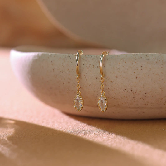 14K gold plated sterling silver drop earrings with marquise cut cubic zirconia.
