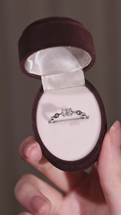 East-West: 0.5ct Oval Moissanite Chain Ring