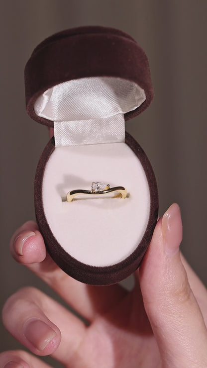 The Curved Pear Solitaire: 0.5ct Moissanite Ring